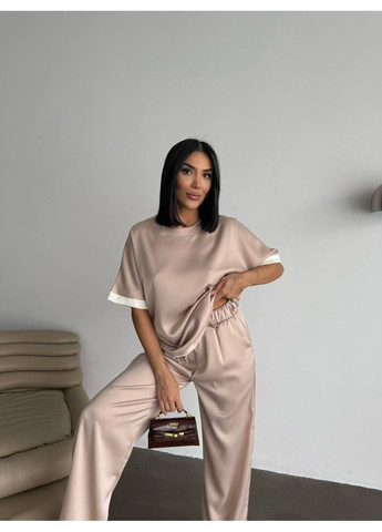 Жіночий костюм з легкої струмкої тканини Україна (358644020)