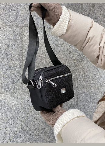 Жіноча сумка крос-боді 8809 на ремінці на три відділи чорна No Brand (290704948)
