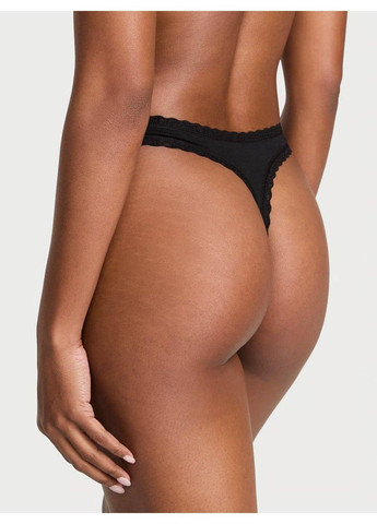 Трусики-стринги женские хлопковые The Lacie Cotton Lace-Waist Thong черные Victoria's Secret (348059497)