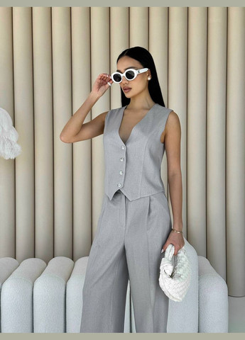 Жіночий костюм двійка жилетка і палаццо колір сірий р.42 453377 New Trend (286330254)