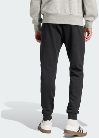 Черные спортивные демисезонные брюки adidas