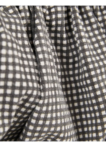 Черная юбка демисезон,черный-белый в клетку, Bershka