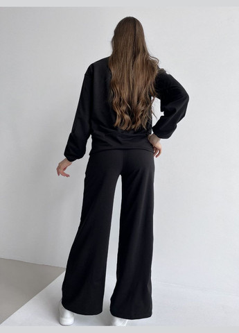 Жіночий спортивний костюм зі штанами палаццо чорного кольору 27034 ML Fashion (296932136)