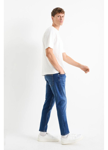 Синие демисезонные джинсы slim tapared C&A