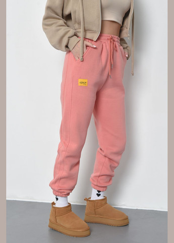 Спортивні штани жіночі на флісі персикового кольору Let's Shop (285739872)