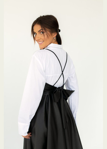 Летний женский сарафан из кожзама на тонких бретелях с клешной юбкой Liton однотонный