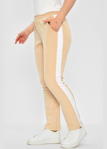 Штани жіночі однотонні бежевого кольору Let's Shop (332767830)