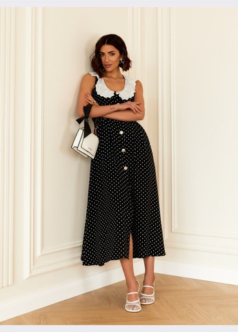 Черное чёрное платье-миди в горох с расклёшенной юбкой Dressa