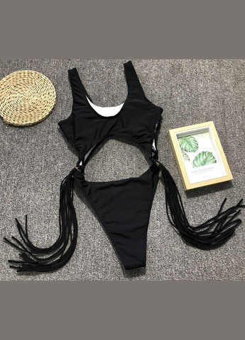 Чорний літній жіночий суцільний купальник монокіні з вісюльками з боків чорний No Brand