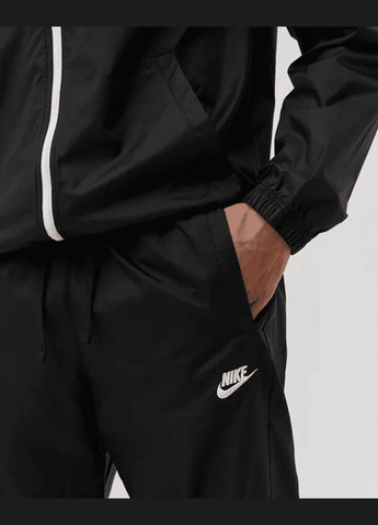 Спортивний костюм чоловічий Lnd Wvn Trk Suit DR3337010 чорний Nike (280438327)