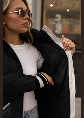 Чорно-біла зимня зимова коротка жіноча куртка чорна з молочним 122252 Svidni