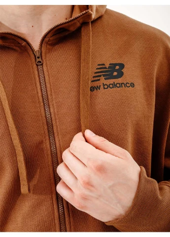 Коричнева зимня чоловіча куртка essentials st logo коричневий New Balance