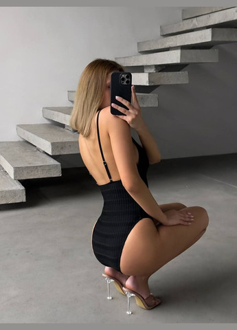 Черный летний купальник с глубоким декольте и прозрачной вставкой по центру слитный Vakko