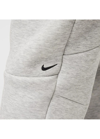 Серые демисезонные брюки Nike