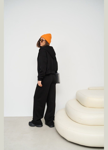 Жіночий костюм двійка з брюками палаццо колір чорний р.L 449555 New Trend (282926372)