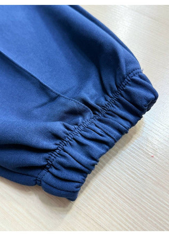 Костюм жіночий 101212 оверсайз футболка і джогери з нашивками темно синій CAPPITONE (341136141)