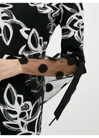 Комбінована чорно-біла сукня міді із зав'язками на рукавах - ua48 / eu42 Iren Klairie