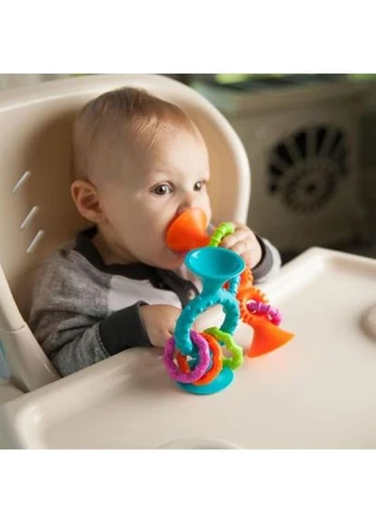 Прорізувач-брязкальце на присосках Squigz Loops, помаранчевий Fat Brain Toys (396651952)