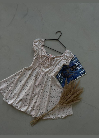 Персикова кежуал міні сукня в квітковий принт з коротким рукавом з пишною спідницею Adelante з квітковим принтом