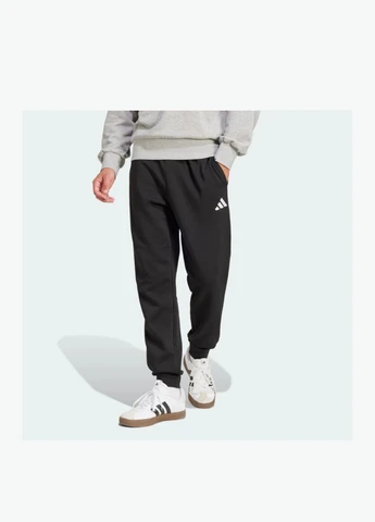 Черные демисезонные брюки adidas