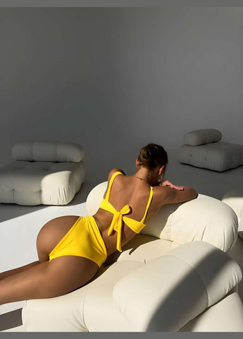 Жовтий літній жіночий літній асиметричний яскравий жовтий суцільний купальник україна No Brand