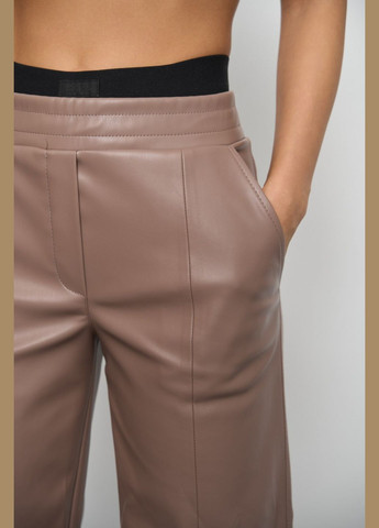 Жіночі штани палаццо з еко шкіри колір капучино р.L 450870 New Trend (282928148)