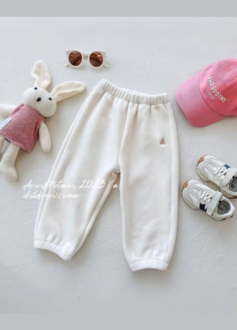 Білий демісезонний костюм дитячий з вишивкою брючний Garna