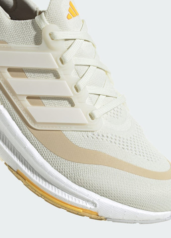 Бежеві всесезонні кросівки для бігу ultraboost light adidas