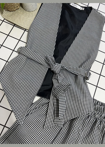 Костюм шкільний для дівчинки жилетка та шорти 128-158 No Brand (346058474)