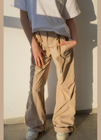 Бежевые коктейльный, спортивные, пляжный, повседневный, кэжуал демисезонные клеш, карго, палаццо брюки IRmAS