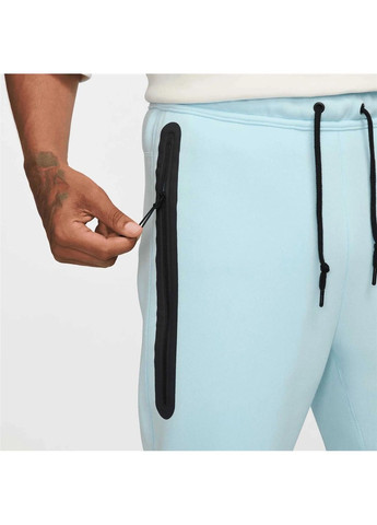 Голубые демисезонные брюки Nike