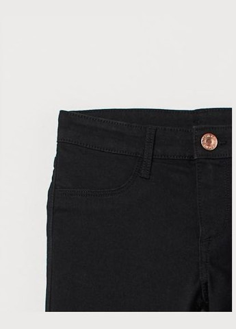 Черные демисезонные зауженные джинсы skinny с регулируемой талией для девочки 0772852001 H&M