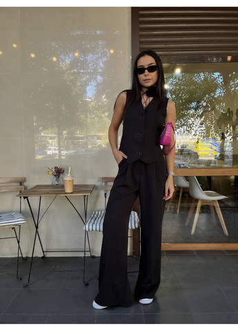 Элегантный женский костюм с жилетом и широкими брюками. Україна (355803475)