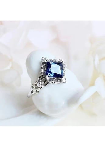Серебристое кольцо с синим и прозрачным синтетическим цирконом, размер 16 Fashion Jewelry (397533978)