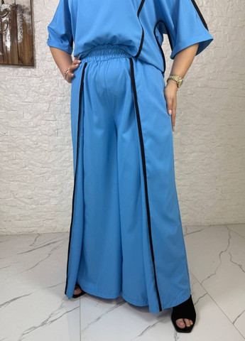 Жіночий повсякденний костюм двійка з кантом: блуза з нерівним низом та штани нахлест Tik-Tak (340163566)