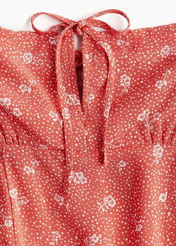 Помаранчева кежуал сукня H&M з квітковим принтом