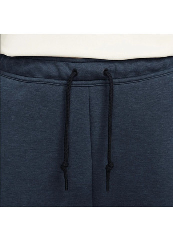 Синие демисезонные брюки Nike