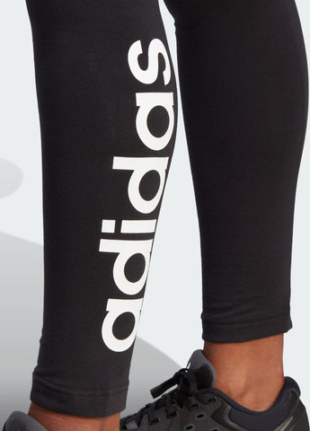 Черные демисезонные леггинсы essentials high-waisted logo adidas