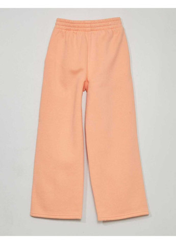 Персиковые брюки Kiabi