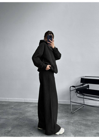 Теплий жіночий флісовий костюм із худі та широкими штанами No Brand (370434235)