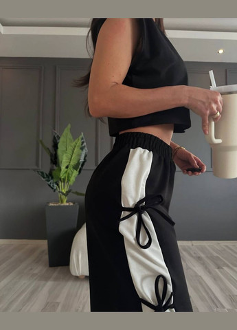 Обьемные женские штаны с лампасами Nositi (327738454)