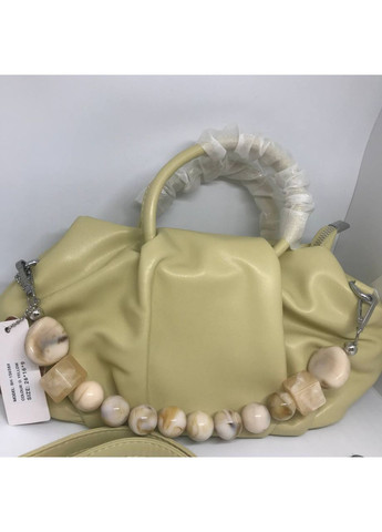 Жіноча сумка з еко шкіри темно-жовта з регульованим ремінцем стильна сумочка для повсякденного використання New Trend (304990683)