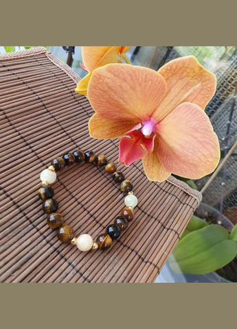 Браслет из натуральных камней тигровый глаз оникс на силиконовой нитке ручная работа на заказ No Brand (344584827)