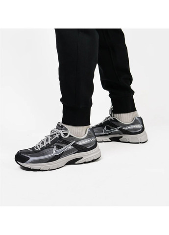 Черные демисезонные брюки Nike