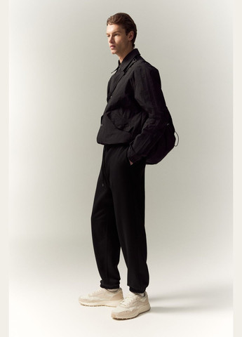 Черные демисезонные брюки H&M
