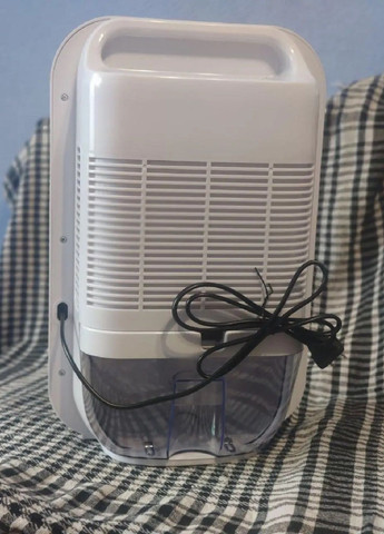 Осушувач повітря вологопоглинач апарат для поглинання вологи з пультом дисплеєм 24.5х13.7х37.5 см (476583-Prob) Білий Unbranded (285104286)