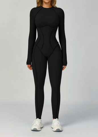 Женский спортивный сплошной комбинезон, декорированный швами с длинным рукавом и открытой спинкой. Strunka комбинезон-брюки однотонный чёрный спортивный