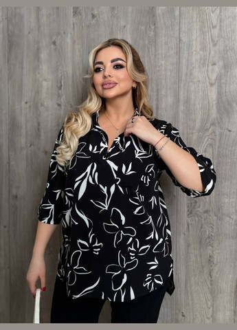 Чорна жіноча блузка вільного крою з широким рукавом MonCher