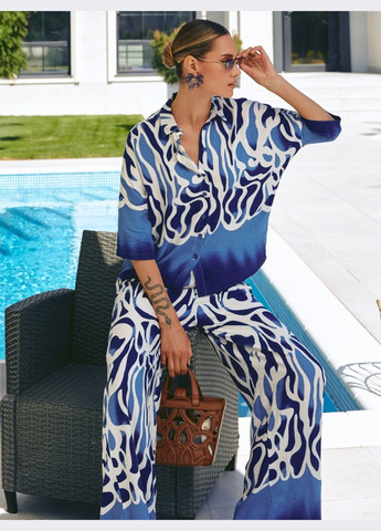 принтованный костюм с брюками и рубашкой синий Dressa (336387695)