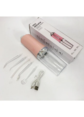 Іригатор для чищення зубів і порожнини рота Oral Irrigator з акумулятором і змінними насадками. Колір: рожевий NC-88 No Brand (377909701)